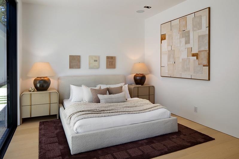 349 Walsh Road Atherton, CA 94027 - Photo 27 of 34 a bedroom with a bed and a painting on the wall