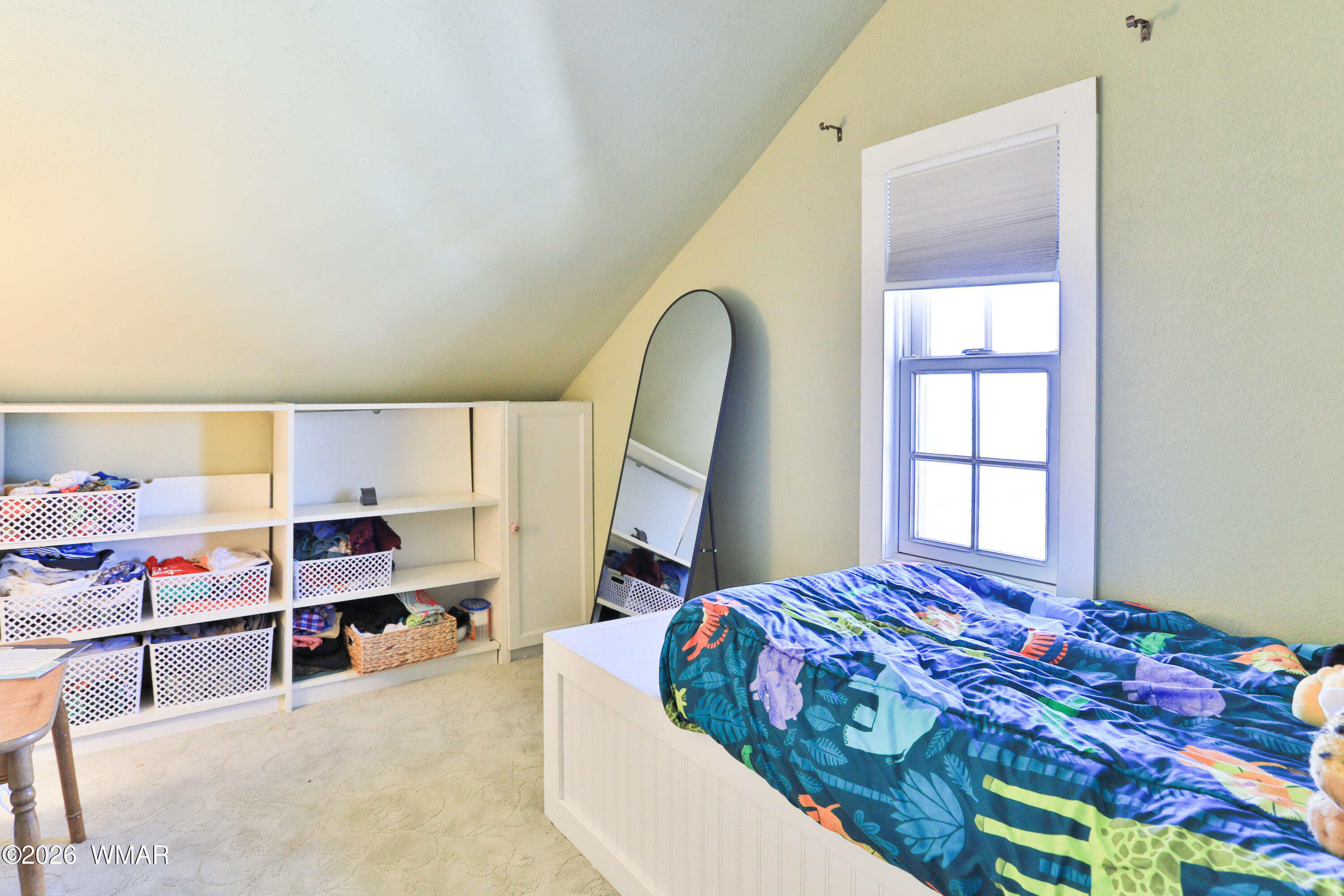 102 Crestview Road Holbrook, AZ 86025 - Photo 35 of 55 a bedroom with a bed and a window