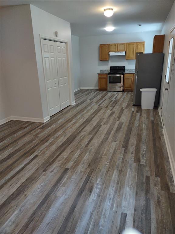 7675 Campground Road, Unit A Cumming, GA 30040 - Photo 3 of 13 a view of a livingroom with furniture and wooden floor