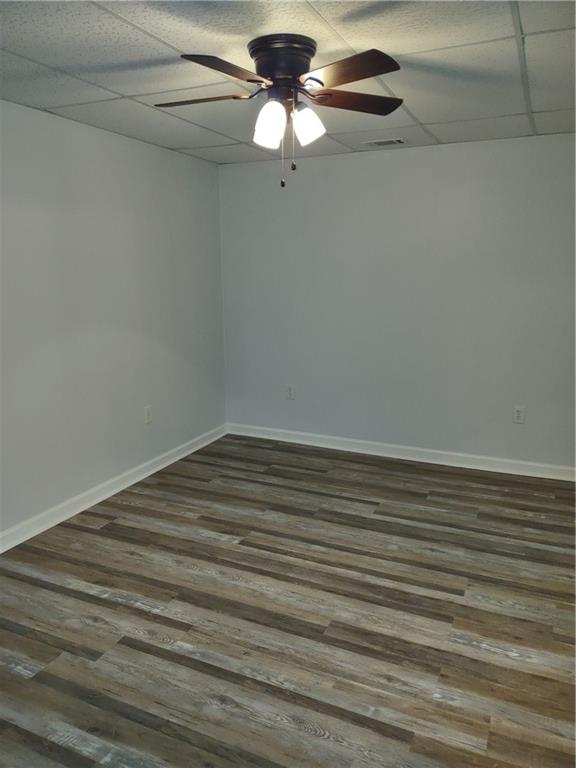 7675 Campground Road, Unit A Cumming, GA 30040 - Photo 8 of 13 a view of a room with a fan and wooden floor