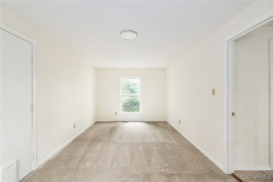 9645 Benbow Road North Chesterfield, VA 23235 - Photo 15 of 44 Tucked off the kitchen, a flex space with carpet,