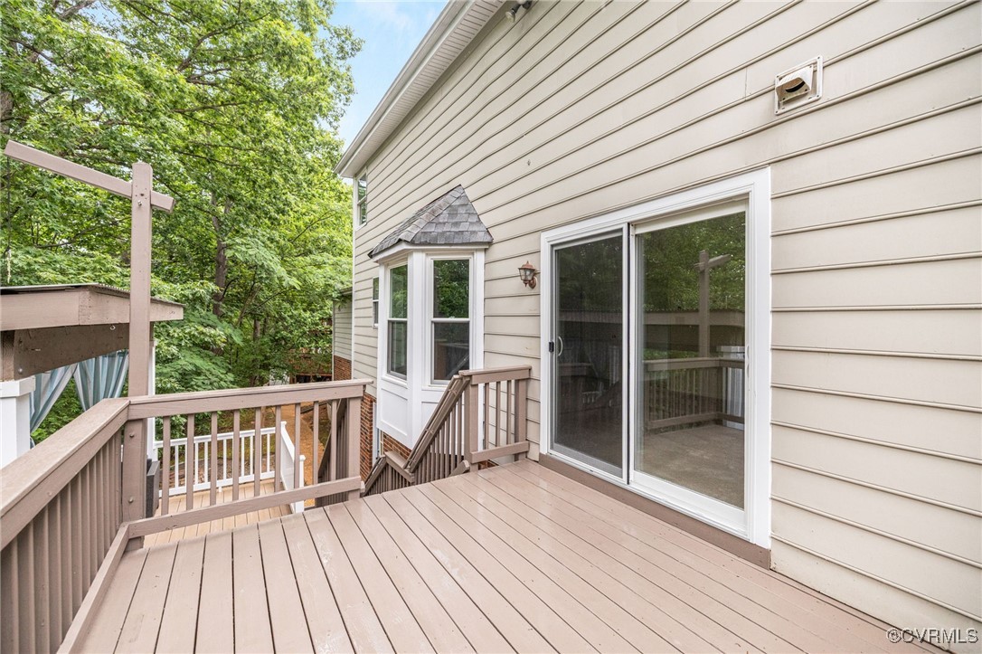 9645 Benbow Road North Chesterfield, VA 23235 - Photo 32 of 44 The two-level deck has been freshly painted and th