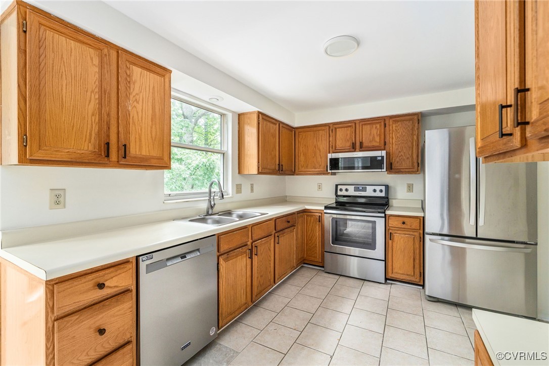 9645 Benbow Road North Chesterfield, VA 23235 - Photo 8 of 44 The light and bright kitchen features a tile floor