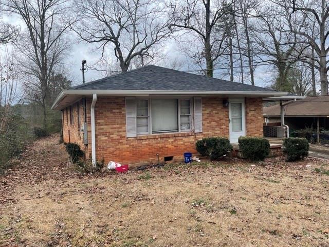 1979 Stanton Street Decatur, GA 30032 - Photo 1 of 1 a front view of a house with yard
