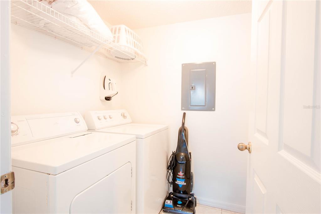 1103 Park Ridge Circle Kissimmee, FL 34746 - Photo 23 of 72 a utility room with dryer and washer