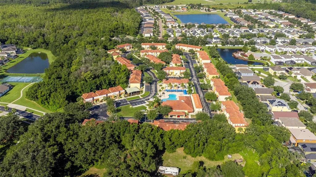 1103 Park Ridge Circle Kissimmee, FL 34746 - Photo 36 of 72 an aerial view of residential houses with outdoor space and trees