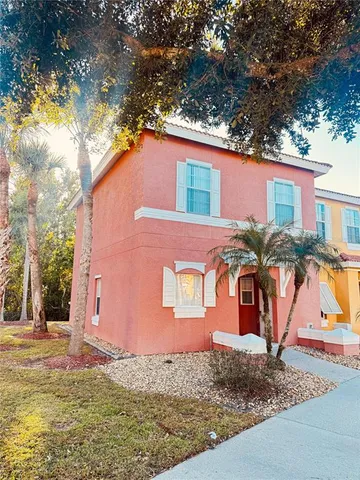 a front view of a house with garage