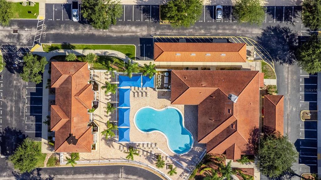 1103 Park Ridge Circle Kissimmee, FL 34746 - Photo 8 of 72 an aerial view of a house with swimming pool and large trees