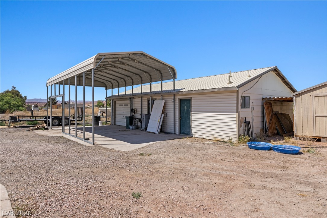 750 Leming Avenue Overton, NV 89040 - Photo 74 of 82 This property offers a spacious carport and garage, perfect for vehicles and outdoor equipment.
