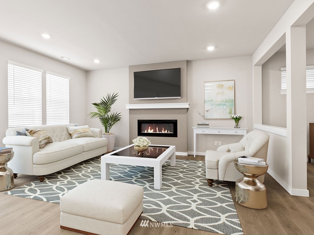 2 181st Street Southeast, Unit 12 Bothell, WA 98012 - Photo 8 of 23 a living room with furniture fireplace and window
