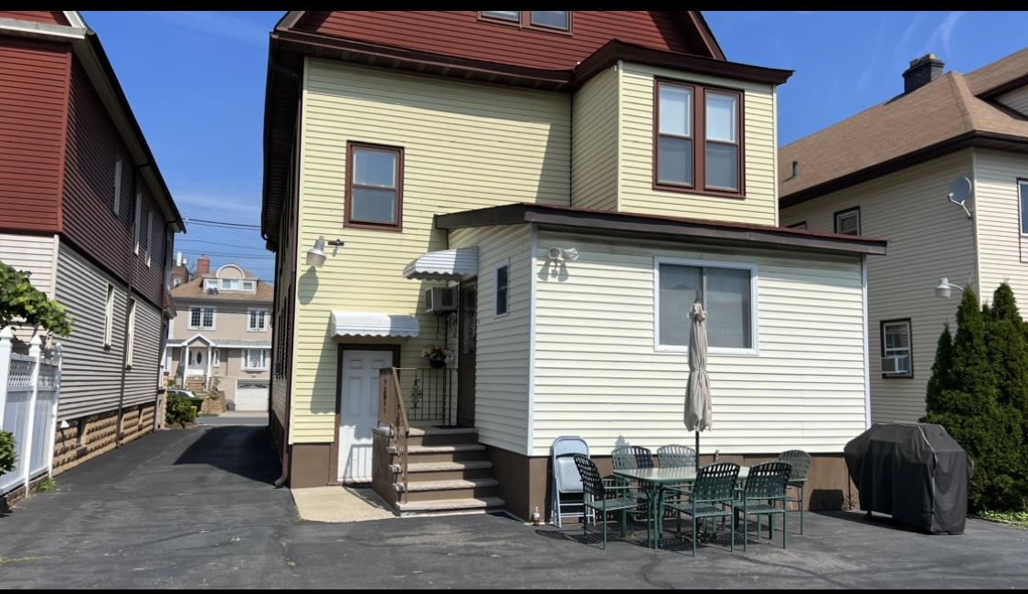 252 Murray Street, Unit 2 Elizabeth, NJ 07202 - Photo 13 of 14 a view of a house with a patio