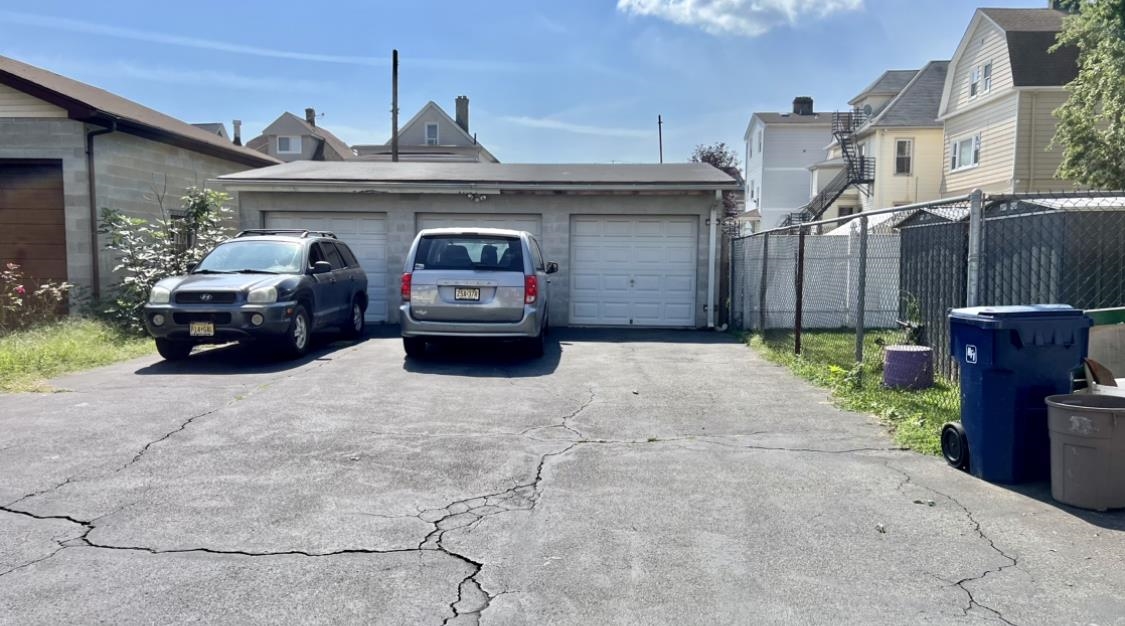 252 Murray Street, Unit 2 Elizabeth, NJ 07202 - Photo 14 of 14 a car parked in front of a building