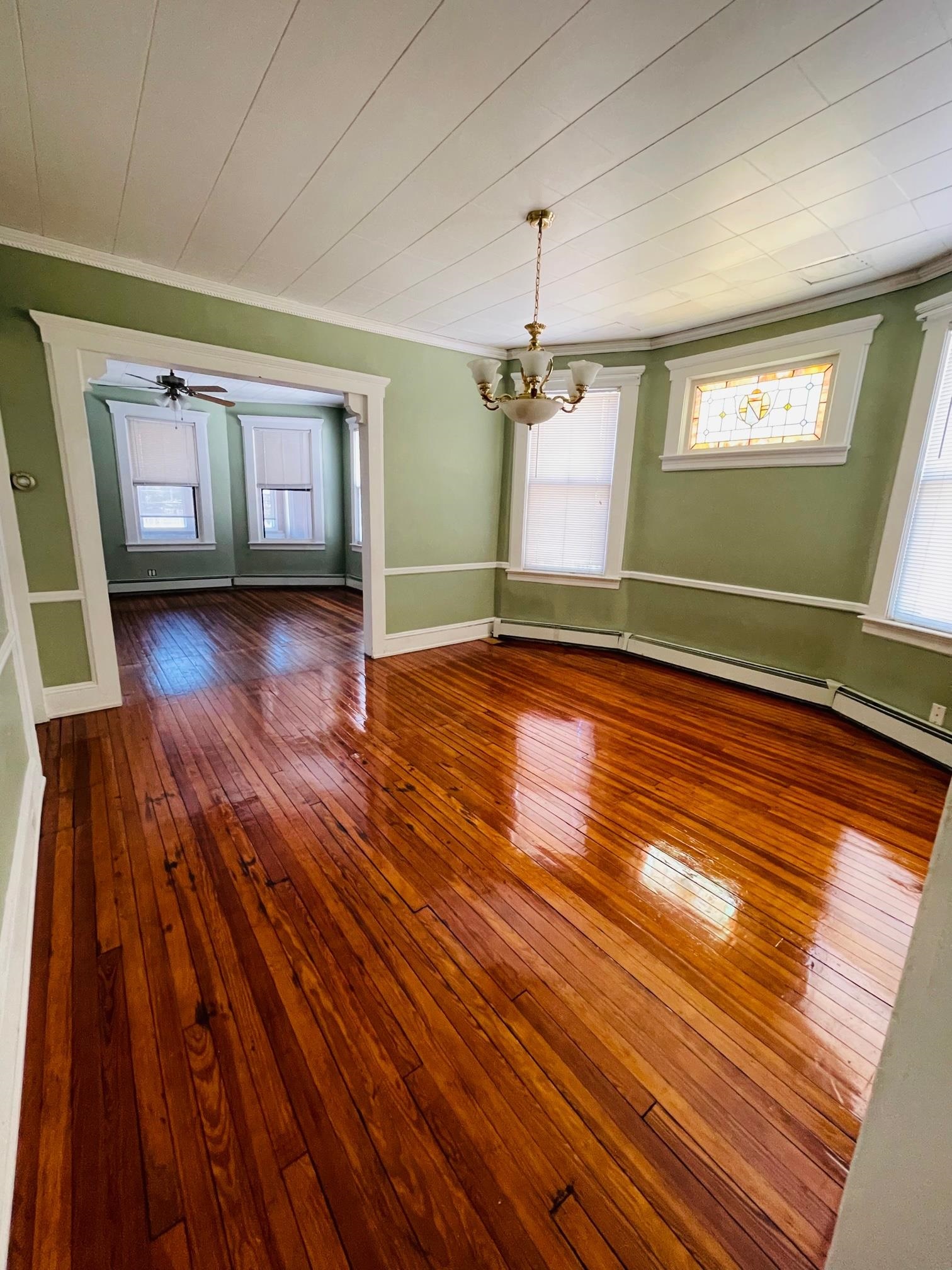 252 Murray Street, Unit 2 Elizabeth, NJ 07202 - Photo 6 of 14 a view of room with window and wooden floor