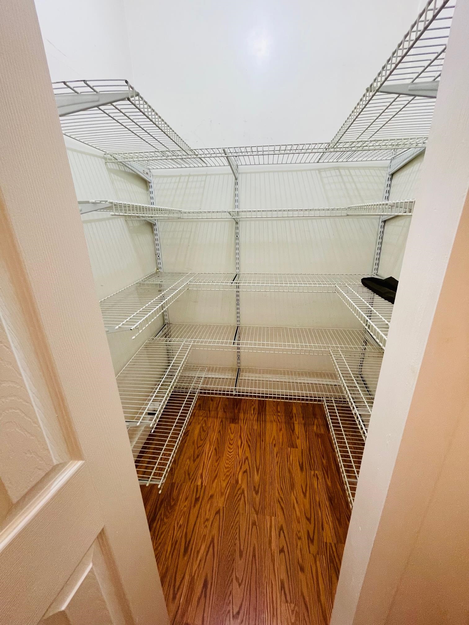252 Murray Street, Unit 2 Elizabeth, NJ 07202 - Photo 10 of 14 a walk in closet with wooden floor