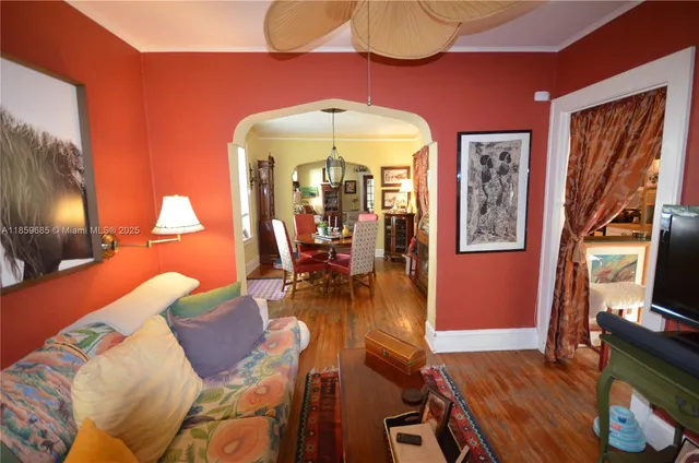 a living room with furniture fireplace and flat screen tv