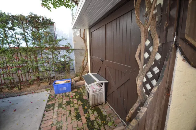 a view of balcony with wooden floor