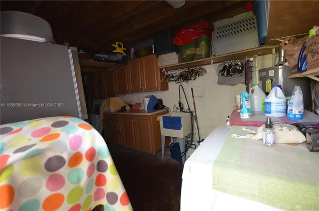 a bedroom with a bed and a mirror