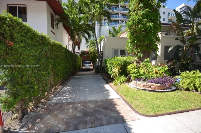 a view of a garden with a fountain