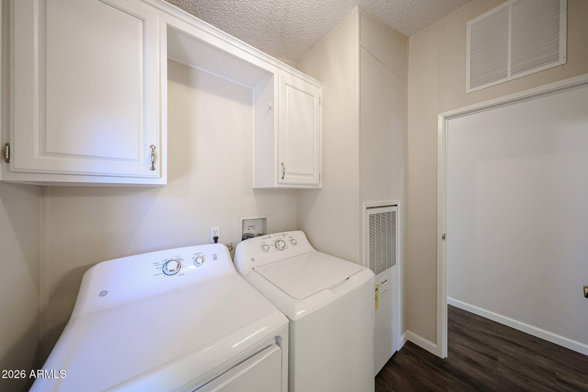 3901 East Pinnacle Peak Road, Unit 355 Phoenix, AZ 85050 - Photo 12 of 29 a view of storage and utility room with washer and dryer