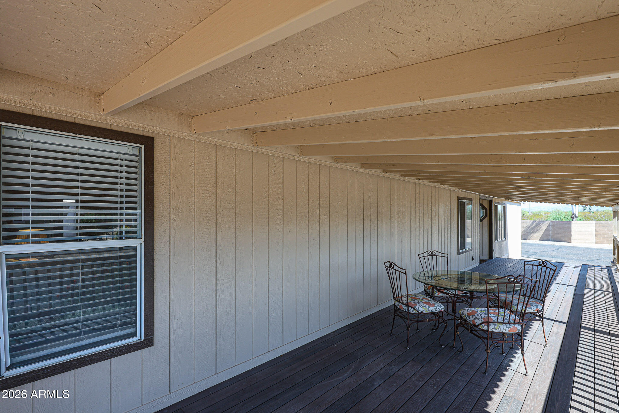 3901 East Pinnacle Peak Road, Unit 355 Phoenix, AZ 85050 - Photo 27 of 29 a view of a dining room with furniture and window