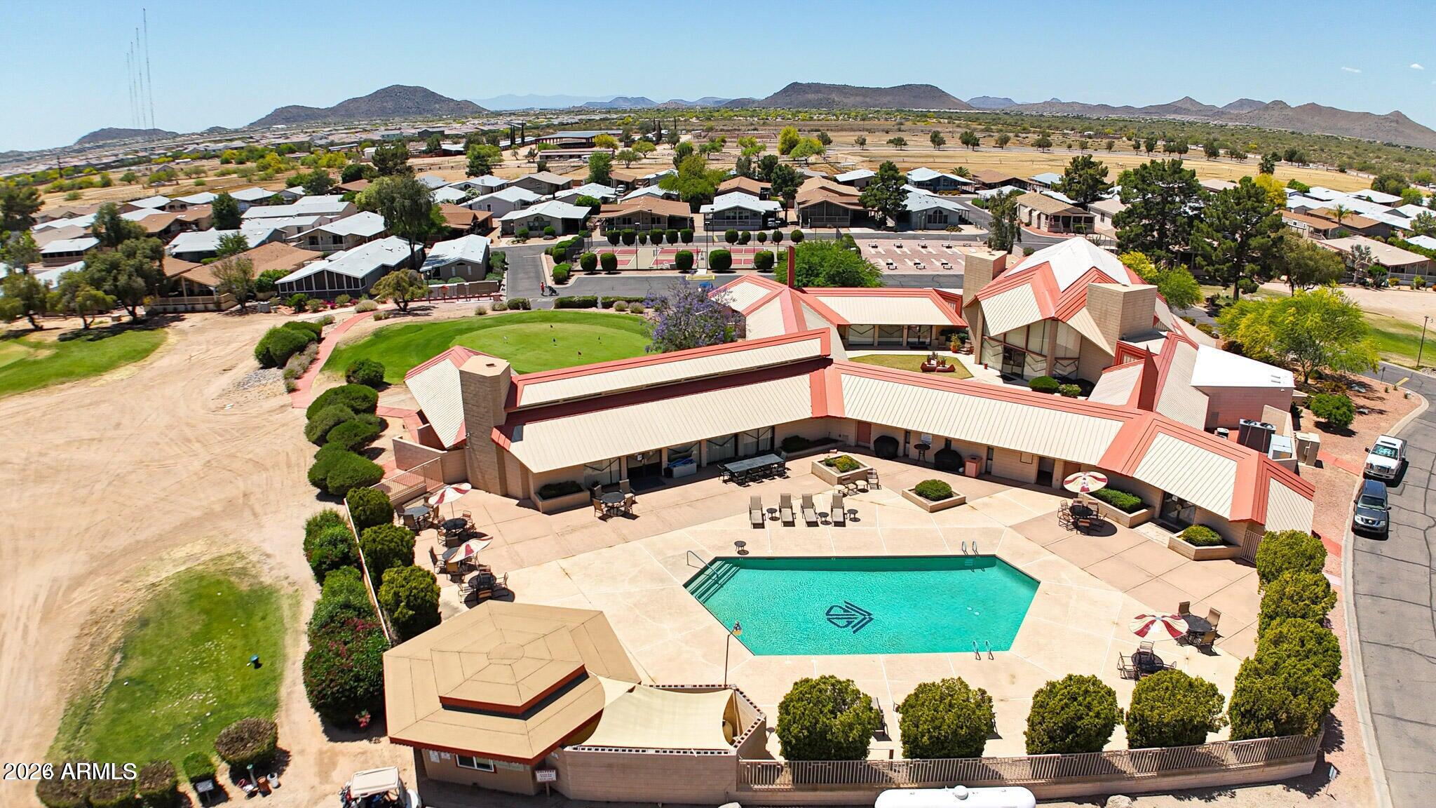 3901 East Pinnacle Peak Road, Unit 355 Phoenix, AZ 85050 - Photo 28 of 29 an aerial view of a houses with a swimming pool