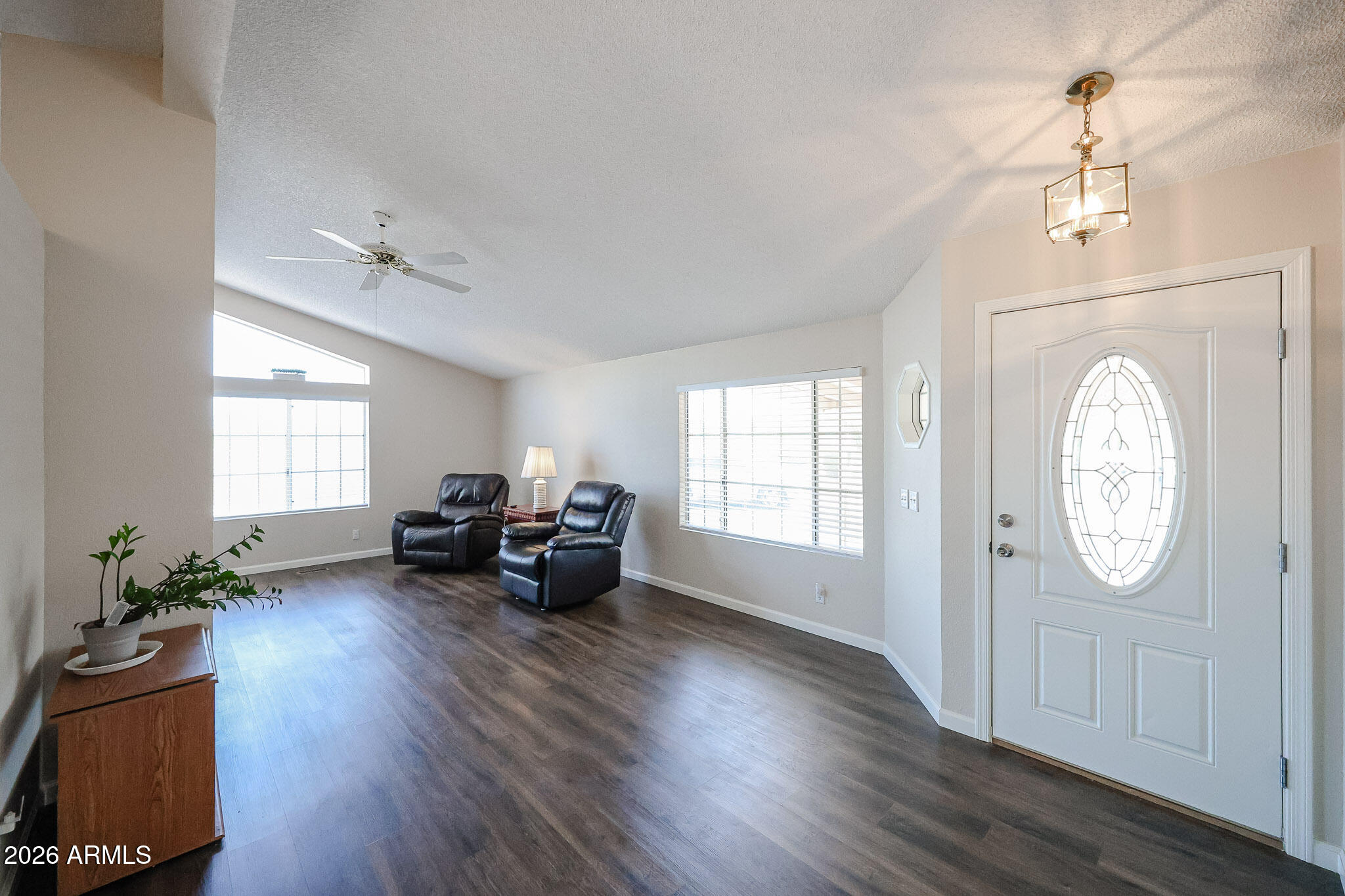3901 East Pinnacle Peak Road, Unit 355 Phoenix, AZ 85050 - Photo 5 of 29 a view of livingroom with furniture hardwood floor and staircase