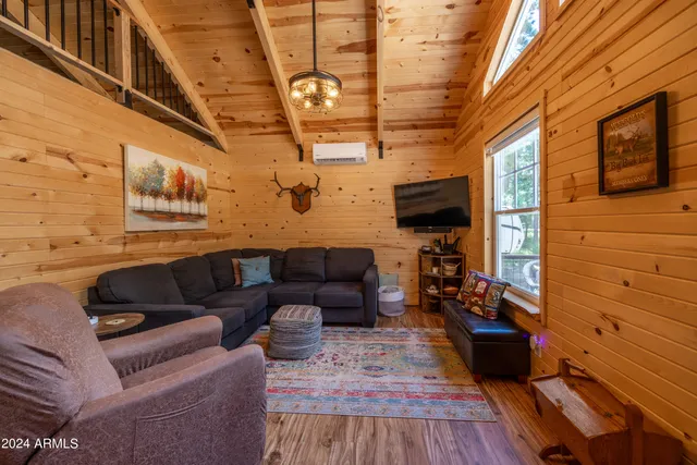 a kitchen with a sink appliances and cabinets