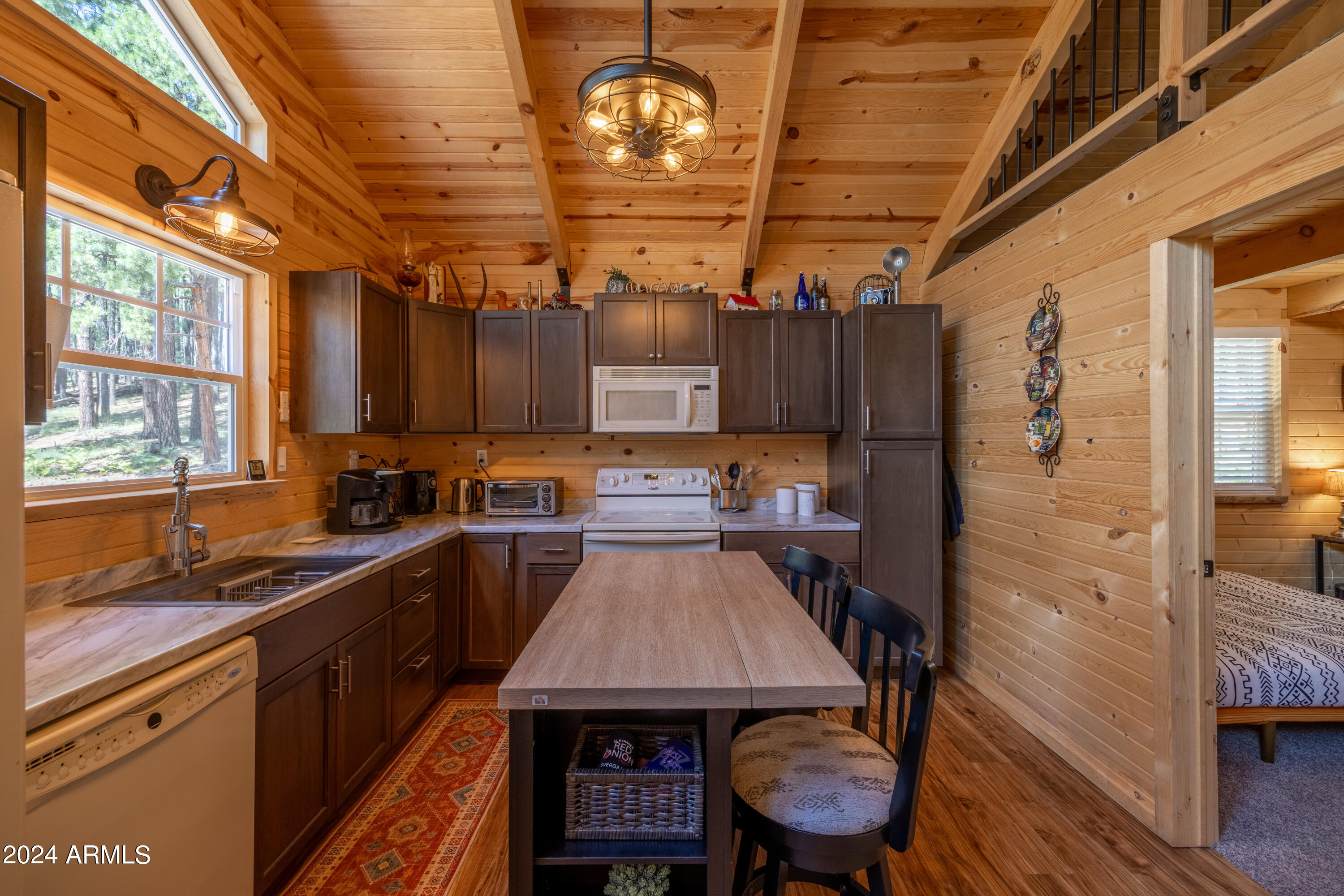 1225 Highway Loop Forest Lakes, AZ 85931 - Photo 15 of 45 a kitchen with a sink appliances and cabinets