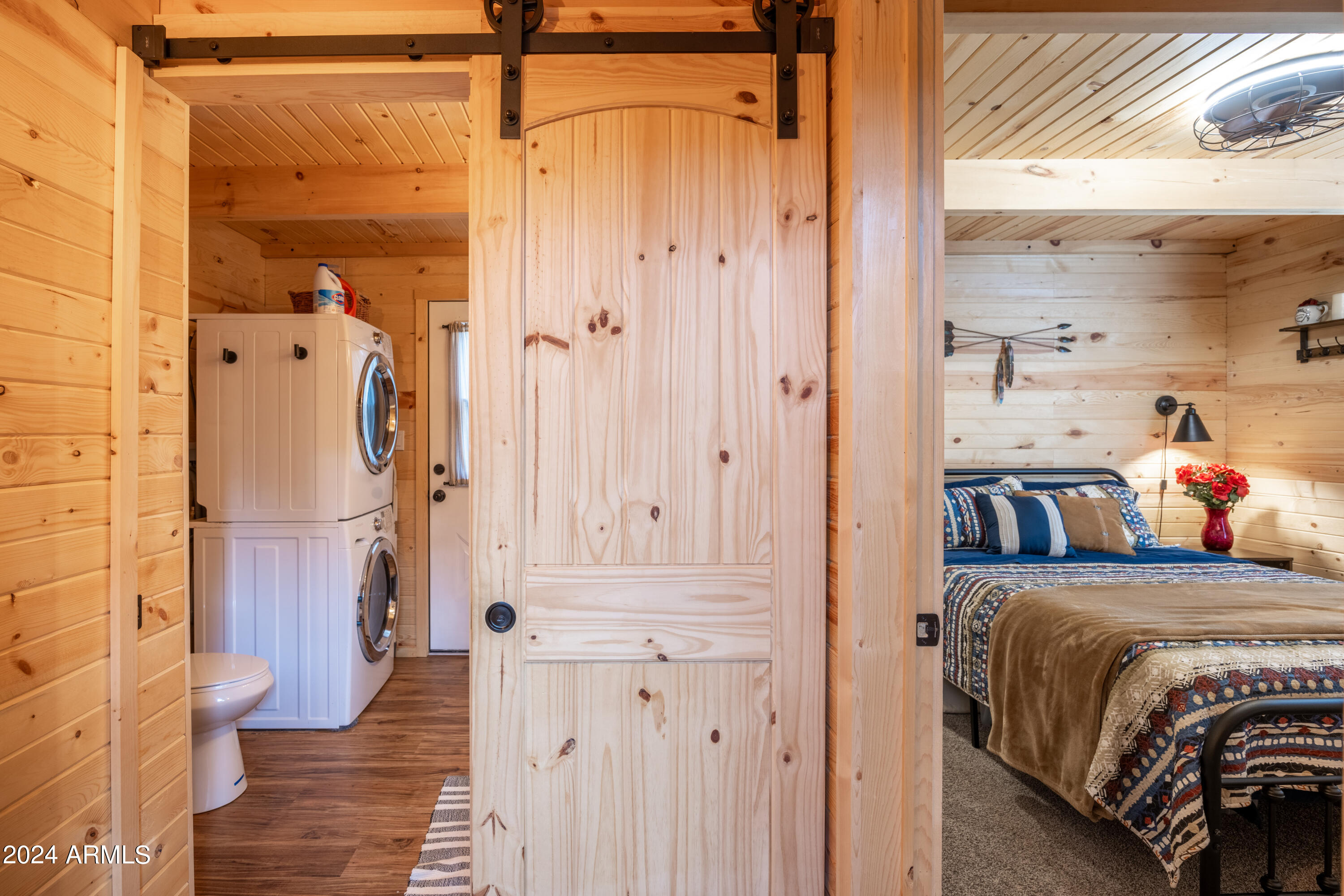 1225 Highway Loop Forest Lakes, AZ 85931 - Photo 22 of 45 a bedroom with a bed and a window