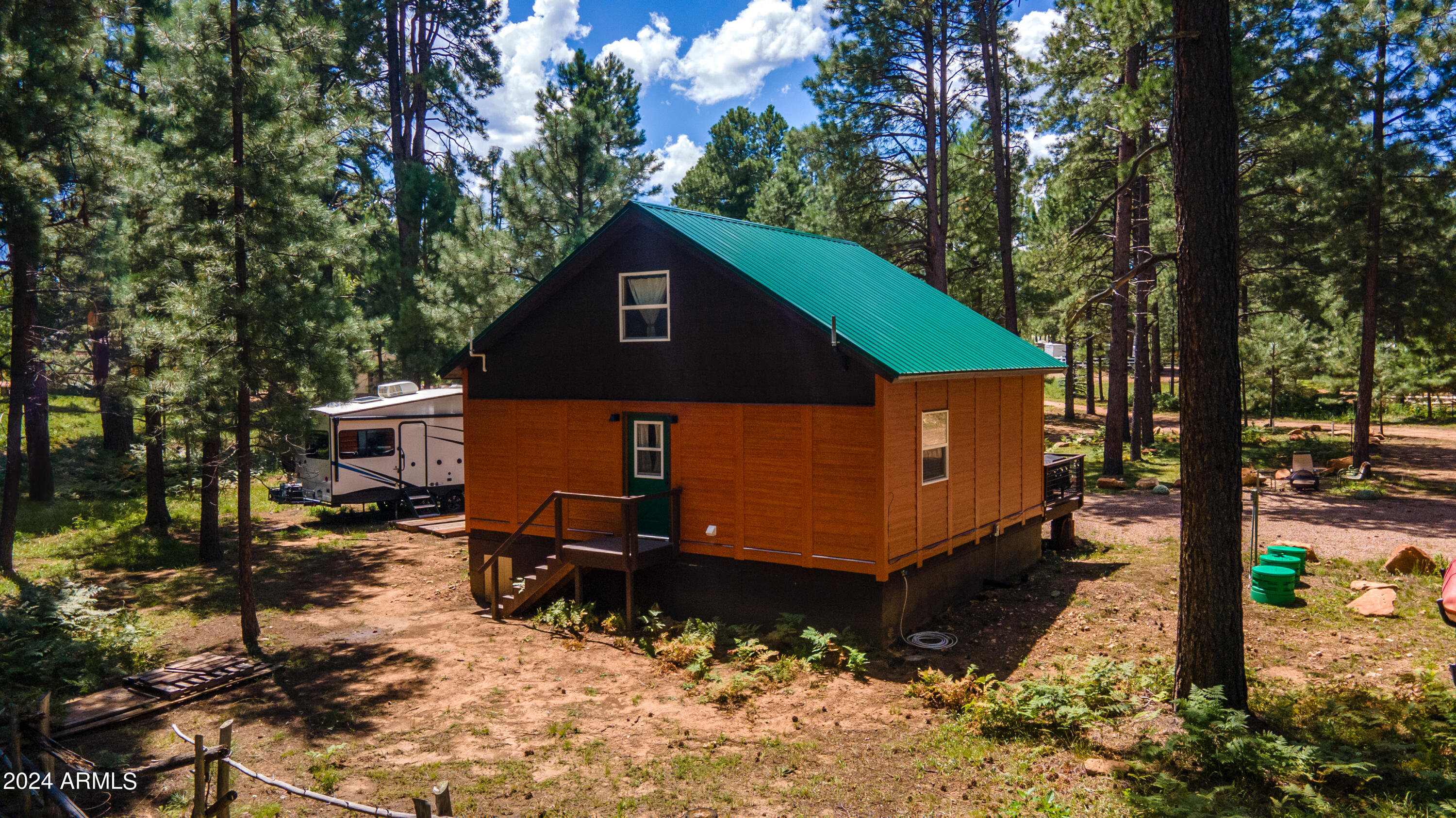 1225 Highway Loop Forest Lakes, AZ 85931 - Photo 34 of 45 a view of a house with a yard siting area and garden