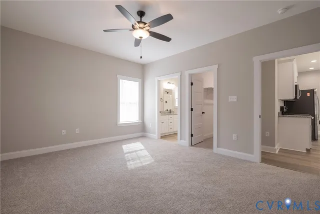 an empty room with a bathroom