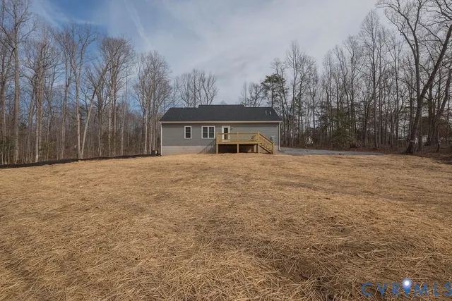 a view of a house with a snow in a yard