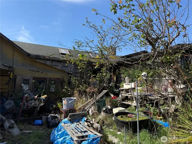 a view of a chairs and table in a patio