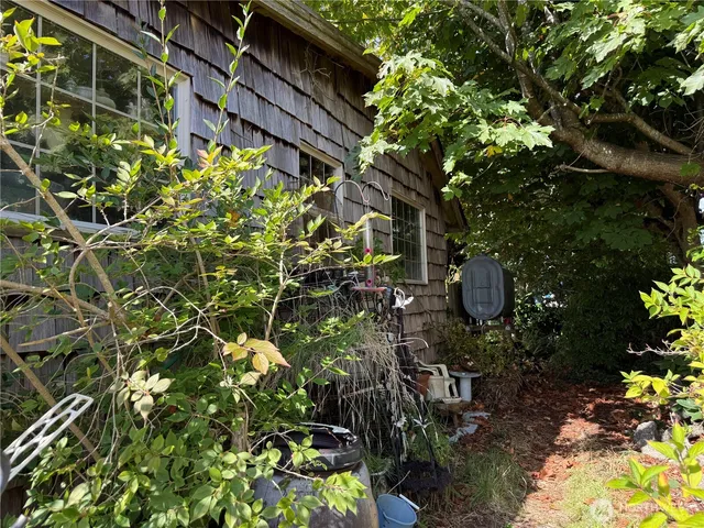 a backyard of a house with lots of green space