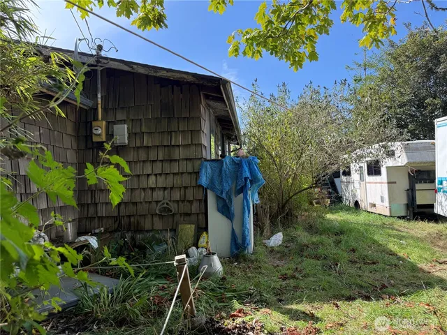 a backyard of a house with lots of green space