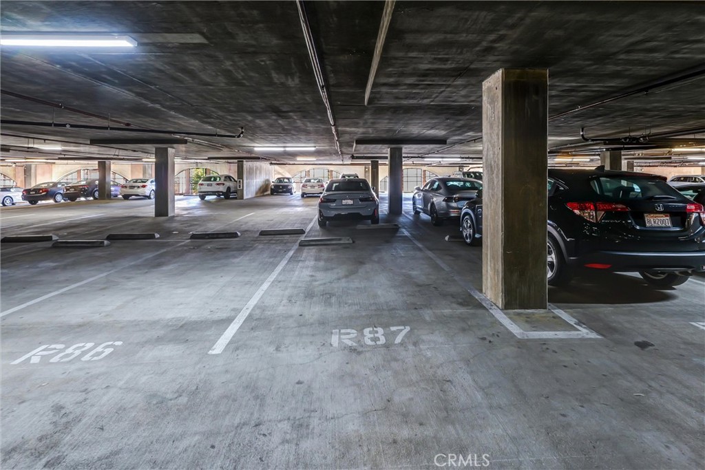 580 West Main Street, Unit 318 Alhambra, CA 91801 - Photo 28 of 33 a view of parking garage with cars