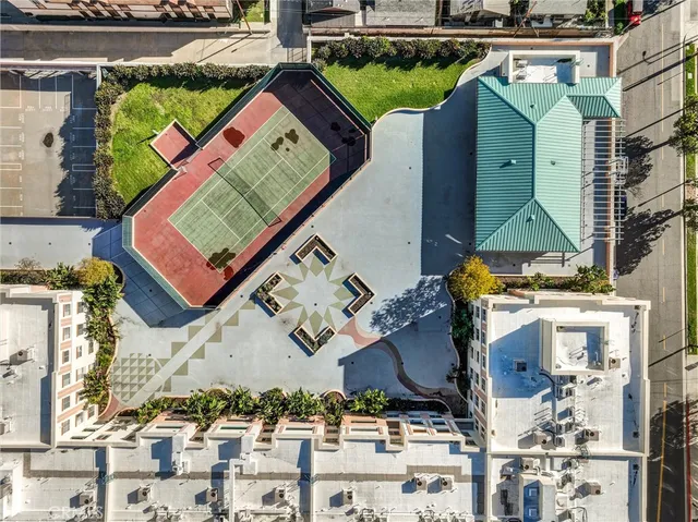 an aerial view of a houses with outdoor space