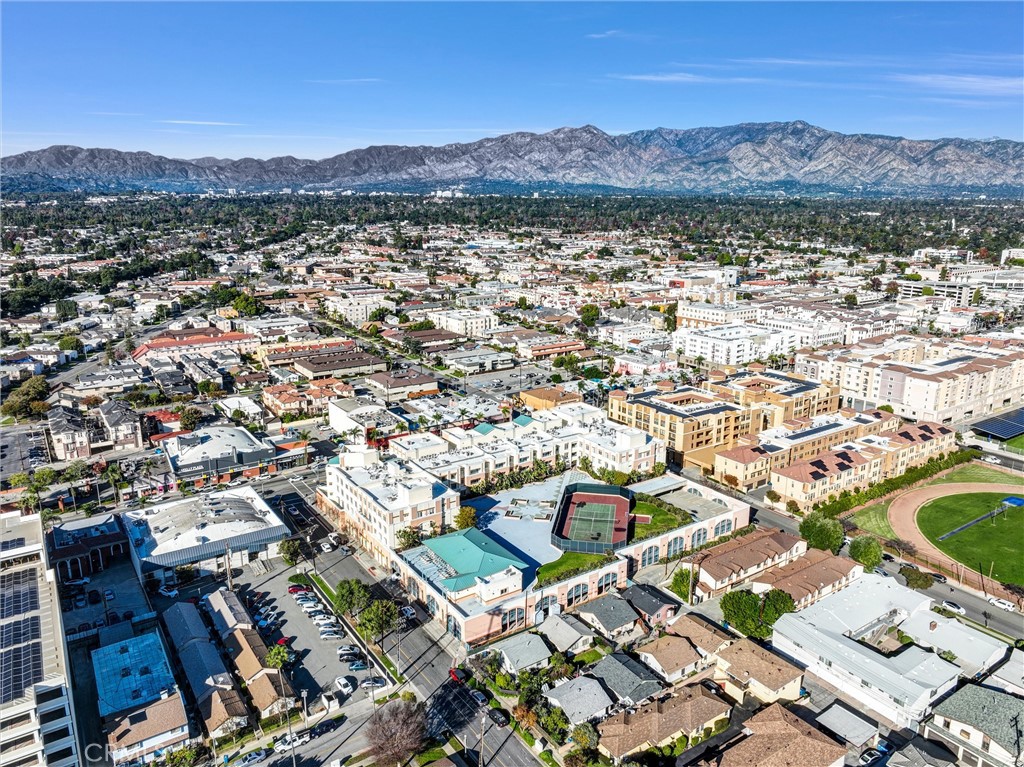 580 West Main Street, Unit 318 Alhambra, CA 91801 - Photo 32 of 33 an aerial view of residential house with outdoor space