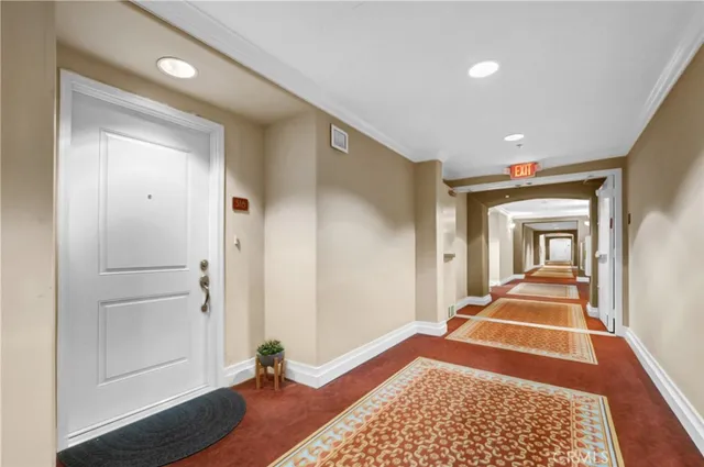 a hallway view with black and white walls