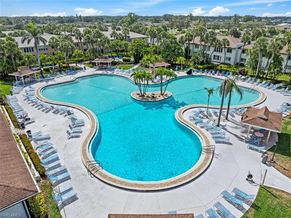 a view of a swimming pool with a patio