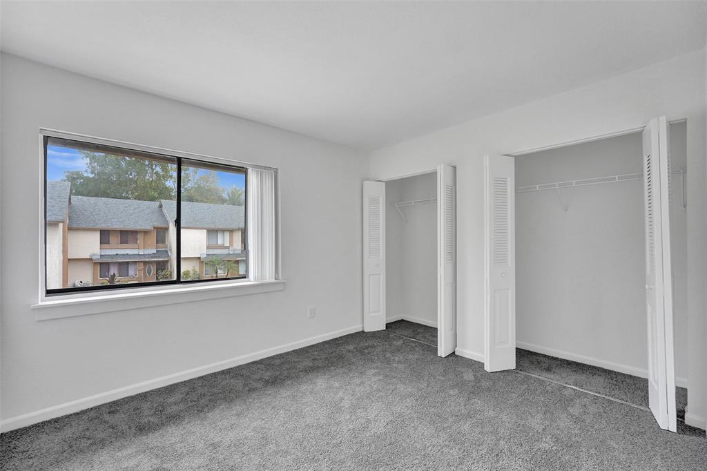 26 Wimbledon Lakes Drive, Unit 248 Plantation, FL 33324 - Photo 12 of 26 an empty room with a window