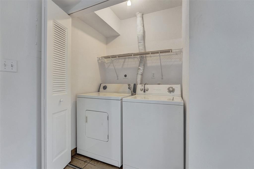26 Wimbledon Lakes Drive, Unit 248 Plantation, FL 33324 - Photo 19 of 26 a utility room with dryer and washer