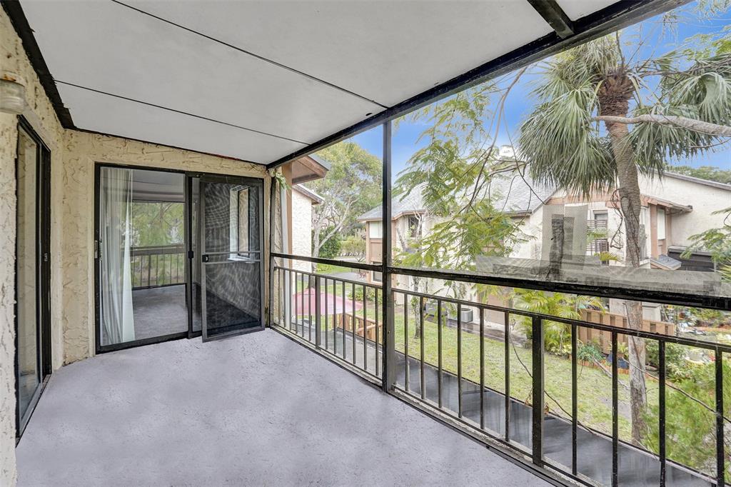 26 Wimbledon Lakes Drive, Unit 248 Plantation, FL 33324 - Photo 6 of 26 a view of a porch