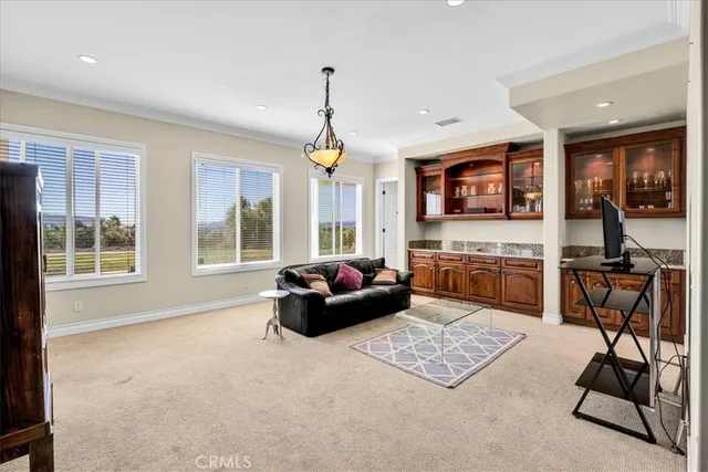 a view of balcony with furniture