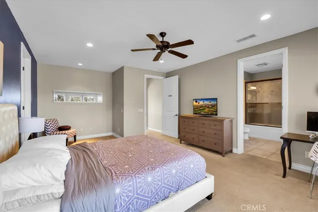 a view of a chairs and table in balcony