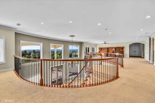 a living room with furniture and flat screen tv