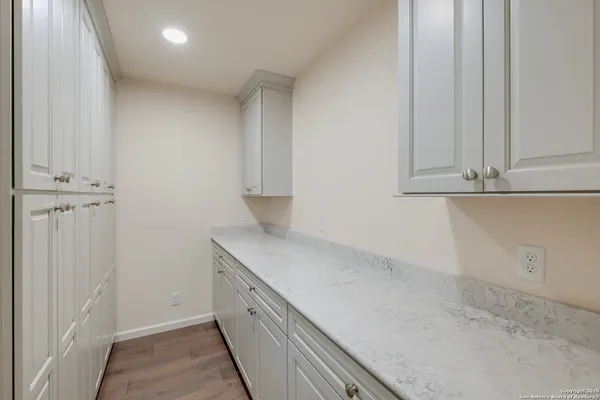 a close view of a sink and dishwasher in kitchen
