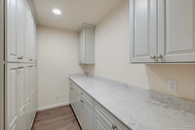 a close view of a sink and dishwasher in kitchen