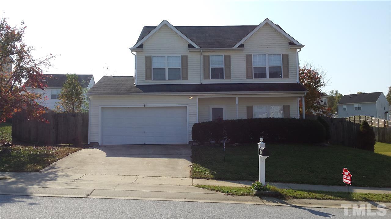 6912 Missionary Ridge Drive Raleigh, NC 27610 - Photo 2 of 16 a front view of a house with a yard