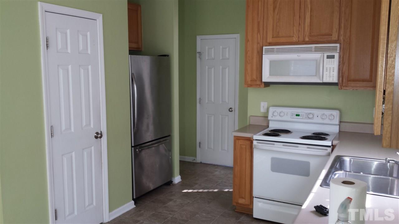 6912 Missionary Ridge Drive Raleigh, NC 27610 - Photo 12 of 16 a room with storage and utility